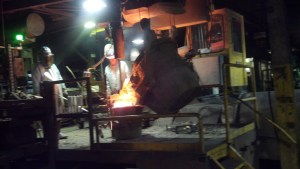 iron being poured from d