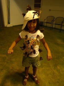 Butterfly garden at 9-years-old. The hat is to draw more butterflies.