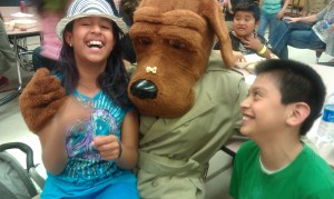 Richfield Dual Language School fiesta. Playing games on McGruff.