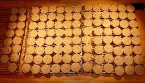 Spitzbuben are sandwich cookies made with ground pecans, butter, flour and sugar. Raspberry jam holds them together. Don't tell my husband there's one missing! Quality control.